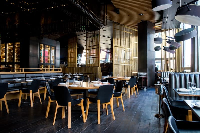 Restaurant dining room with tables set for service